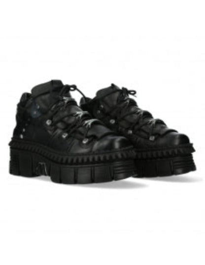 Black high-top sneakers on a white background