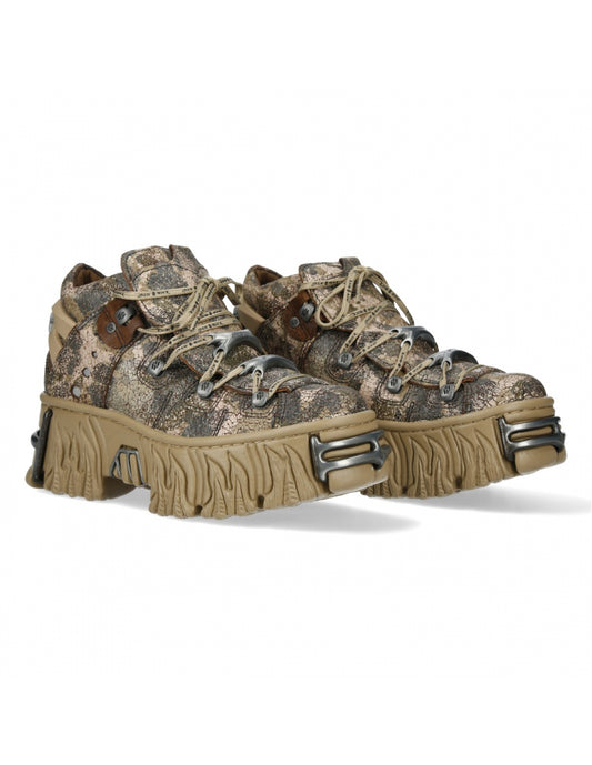Camouflage boots with chunky soles on a white background