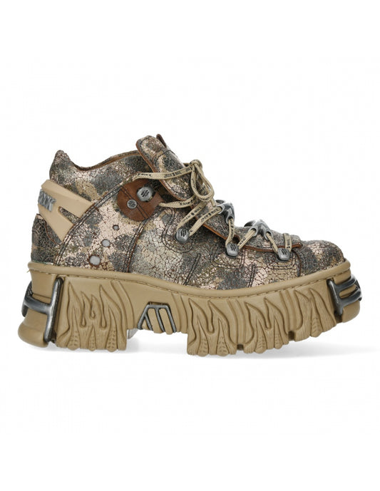 Camouflage hiking boot with chunky sole on a white background