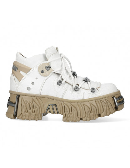 White sneaker with beige sole on a white background