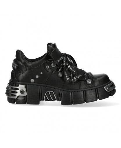 Black sneaker with unique sole design on a white background