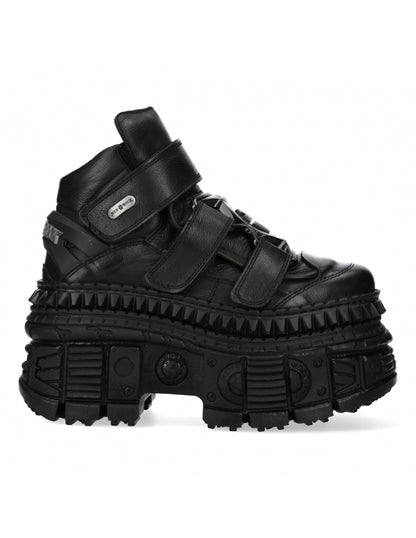 Black high-top sneaker with thick sole on a white background