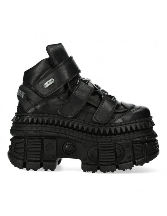 Black high-top sneaker with thick sole on a white background