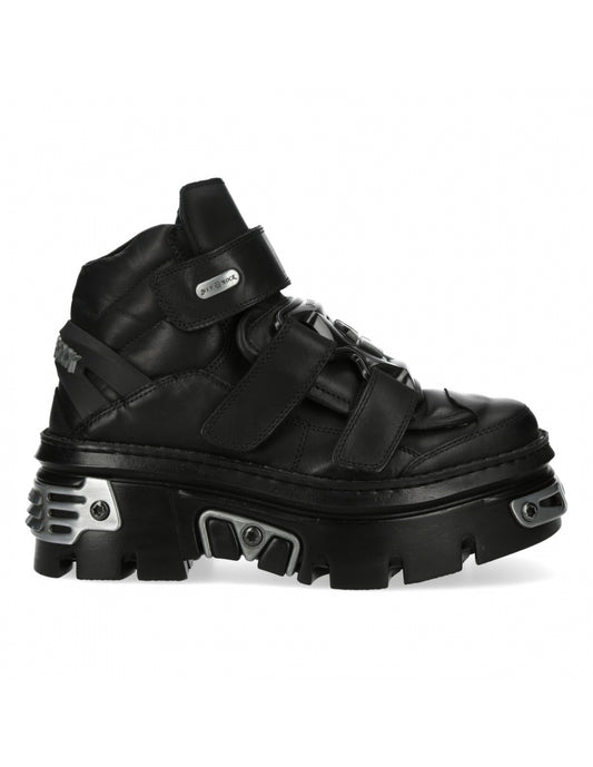 Black high-top sneaker with thick sole on a white background