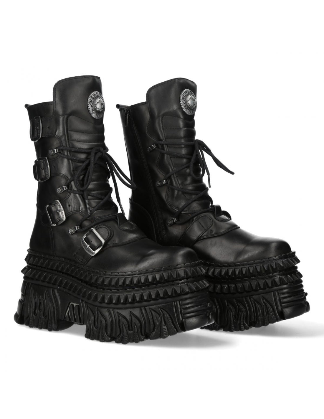 Pair of black leather boots with detailed design on a white background