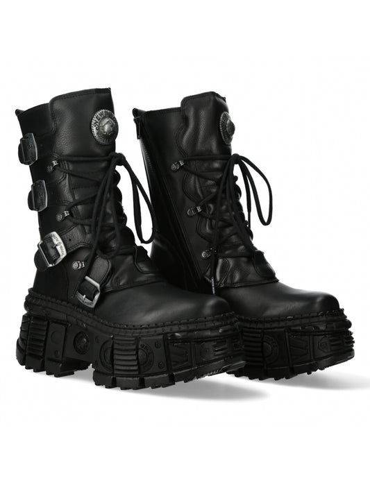 Pair of black leather boots with buckles and laces on a white background