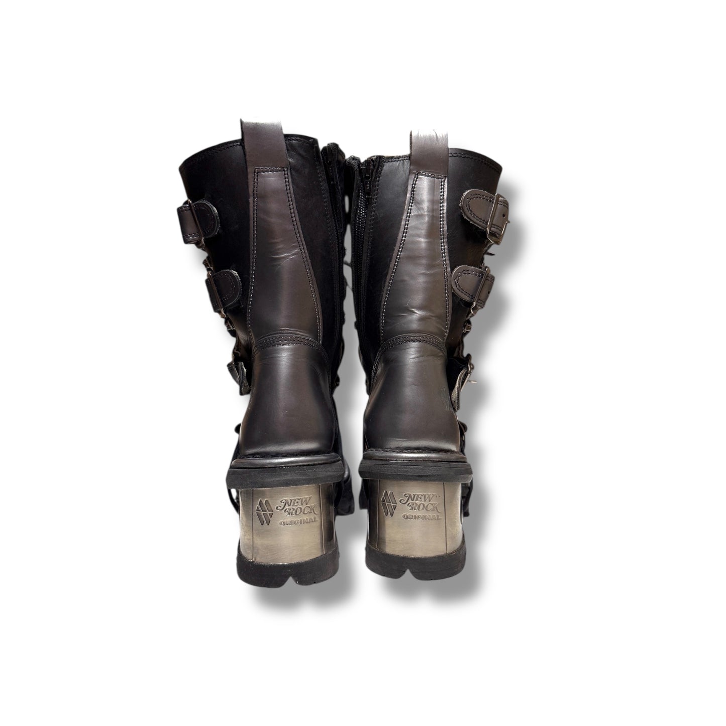 Pair of dark brown leather boots with buckles on a white background