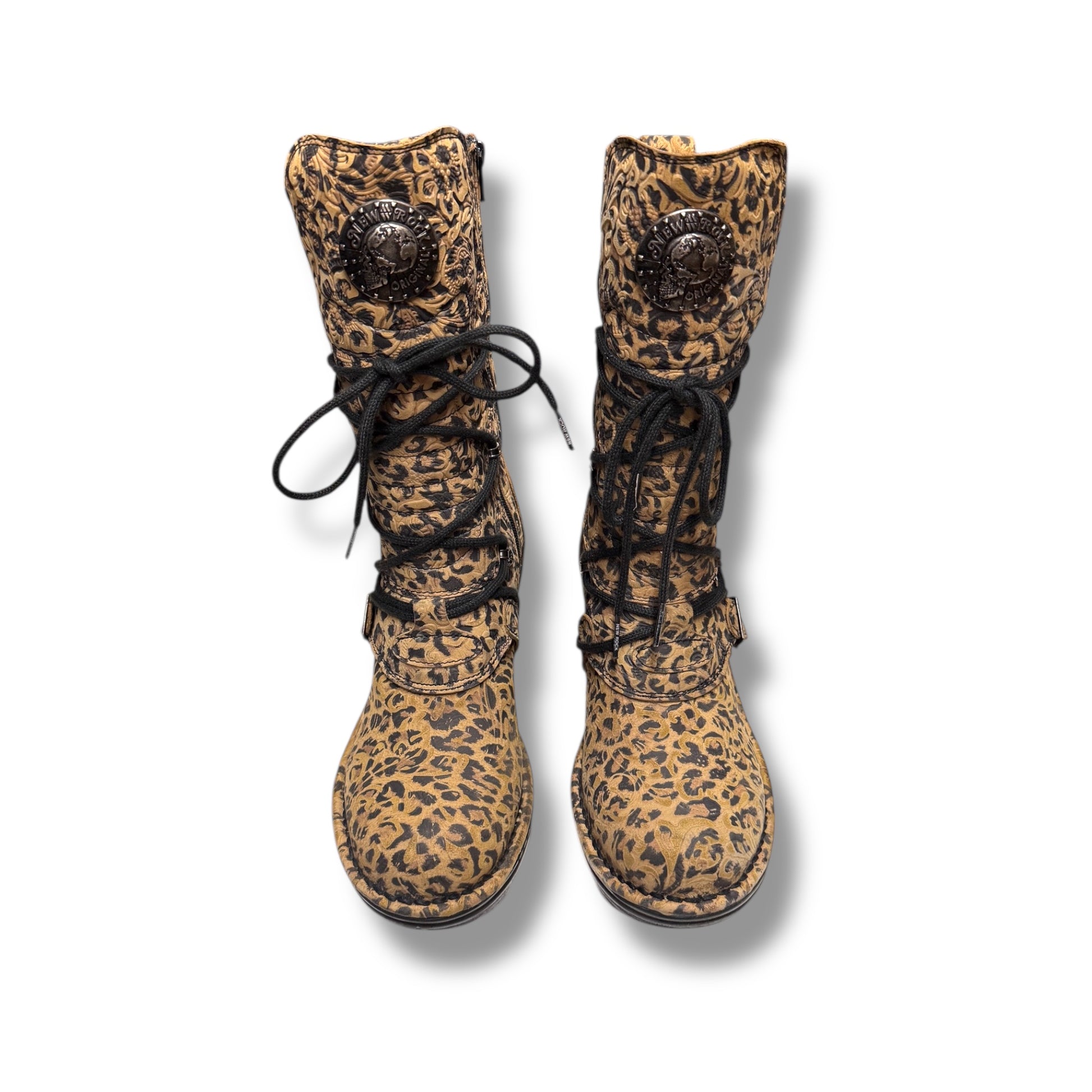 Leopard print boots with black laces on a white background