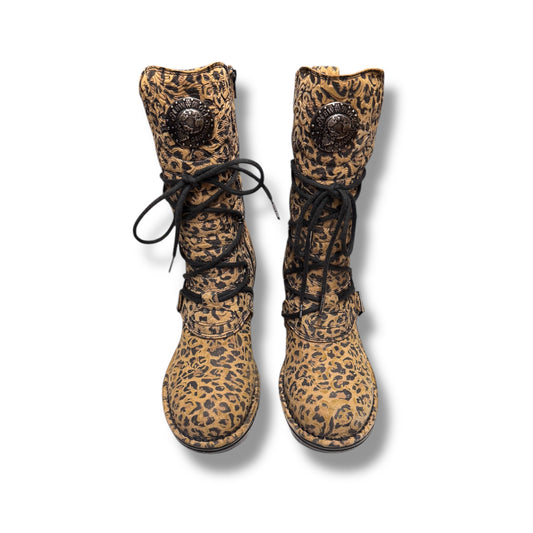 Leopard print boots with black laces on a white background