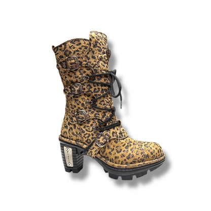 Leopard print boot with black accents on a white background
