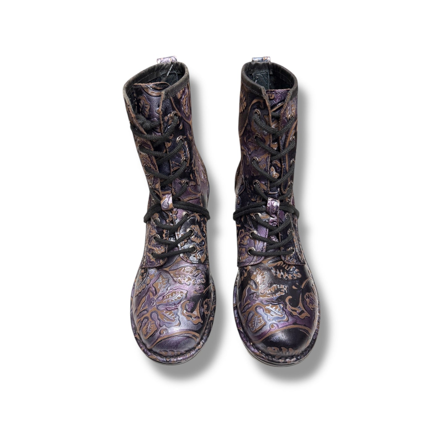 Pair of patterned boots on a white background
