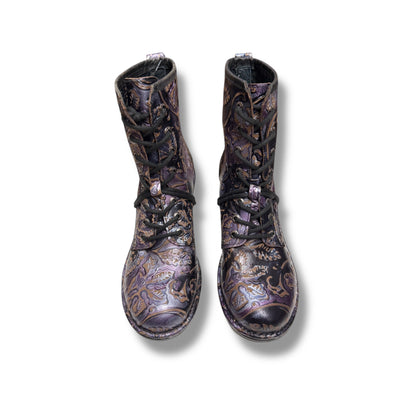 Pair of patterned boots on a white background