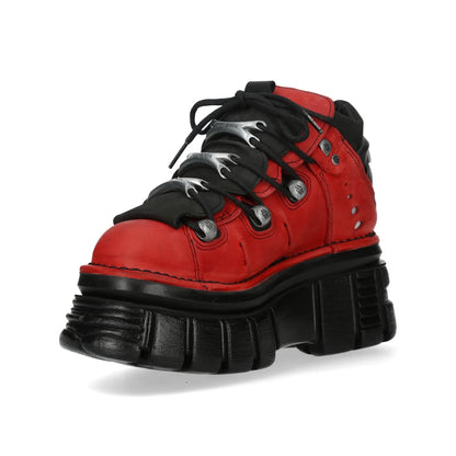Red and black boot with thick sole on a white background