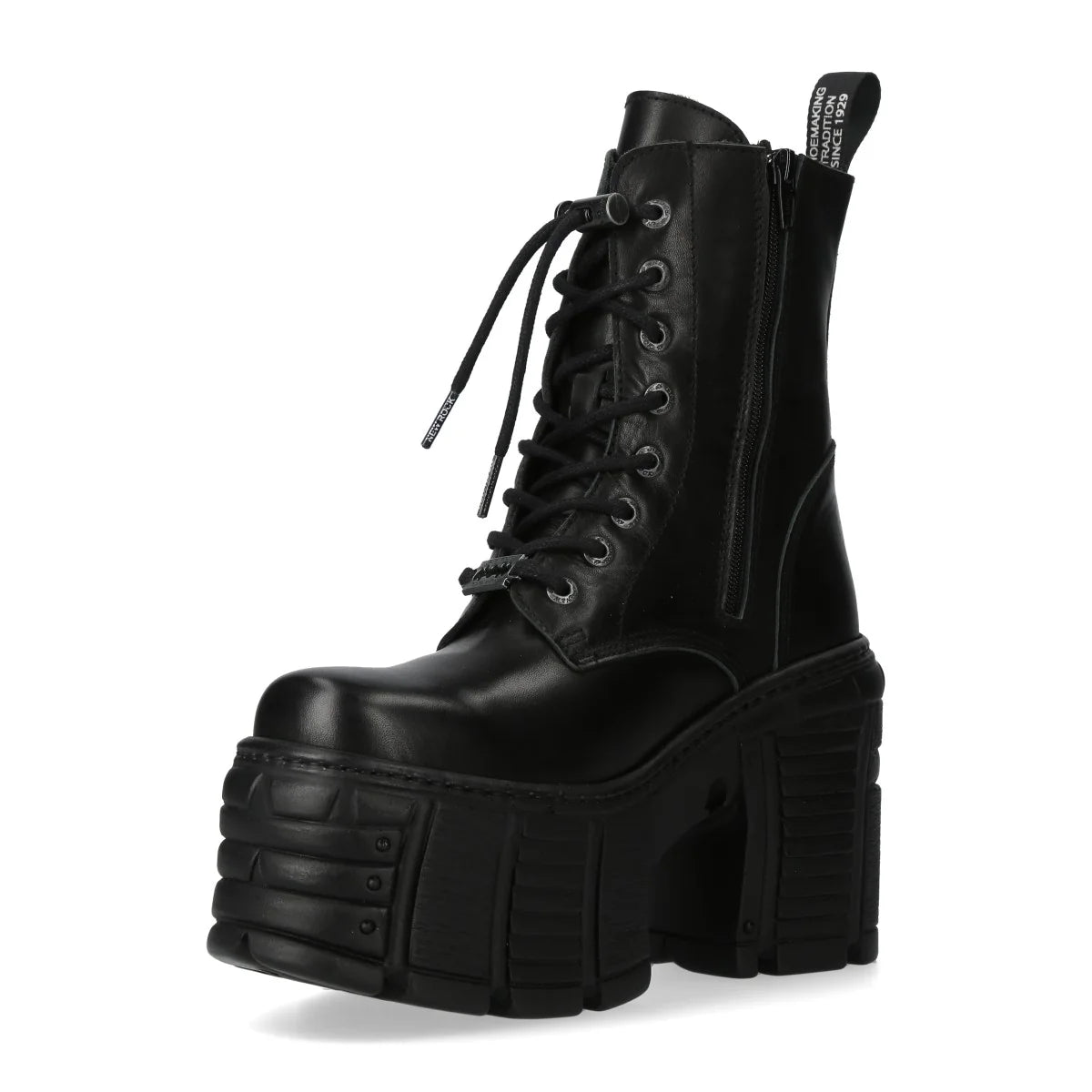 Black platform boot with chunky sole on a white background