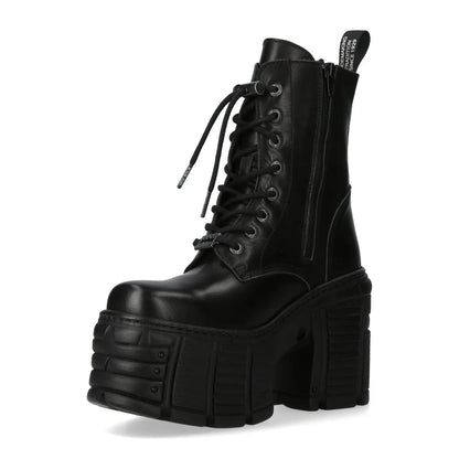 Black platform boot with chunky sole on a white background
