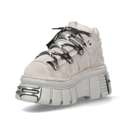A light gray suede high-top platform sneaker with black laces featuring silver metallic 'GIVENCHY' lettering, set against a plain white background.