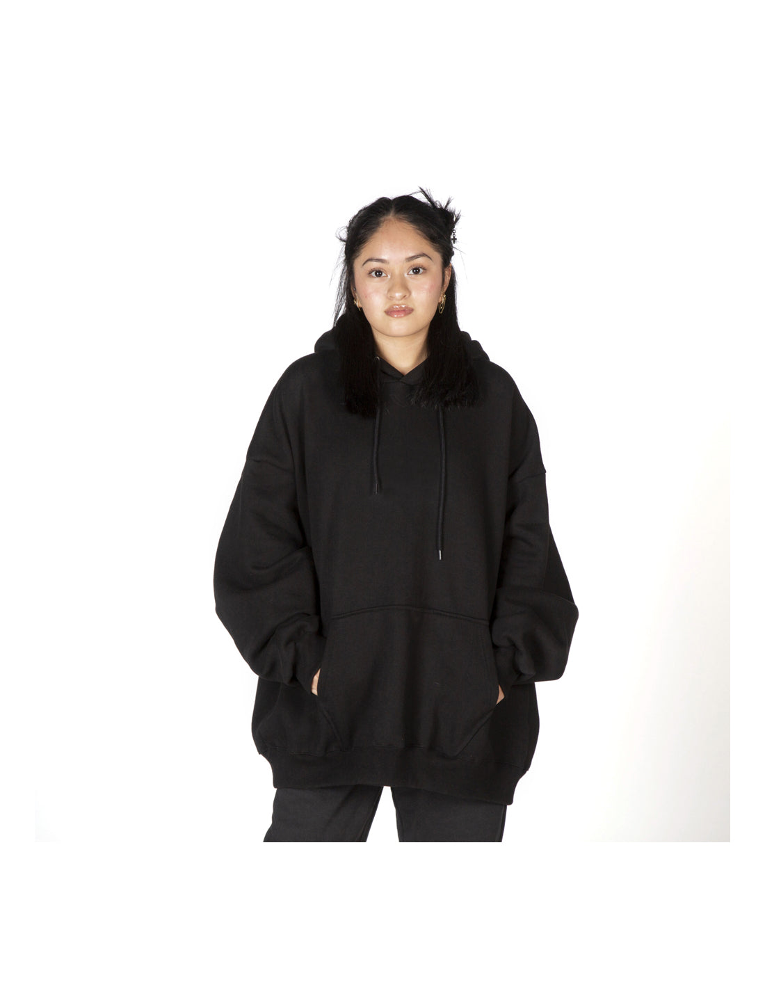 Person wearing a black hoodie on a white background