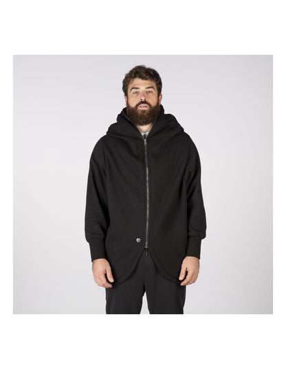 Man wearing a black hooded jacket on a white background