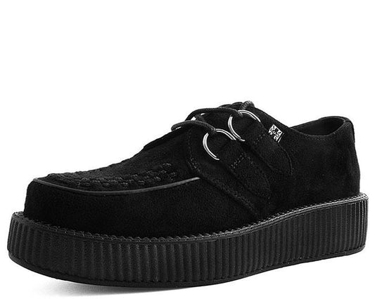 A pair of black fake suede T.U.K Viva Low Creeper shoes with a lace-up closure and a thick white sole.