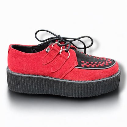 A pair of T.U.K Black and Red Suede Viva Mondo Creepers with a chunky platform and lace-up closure.