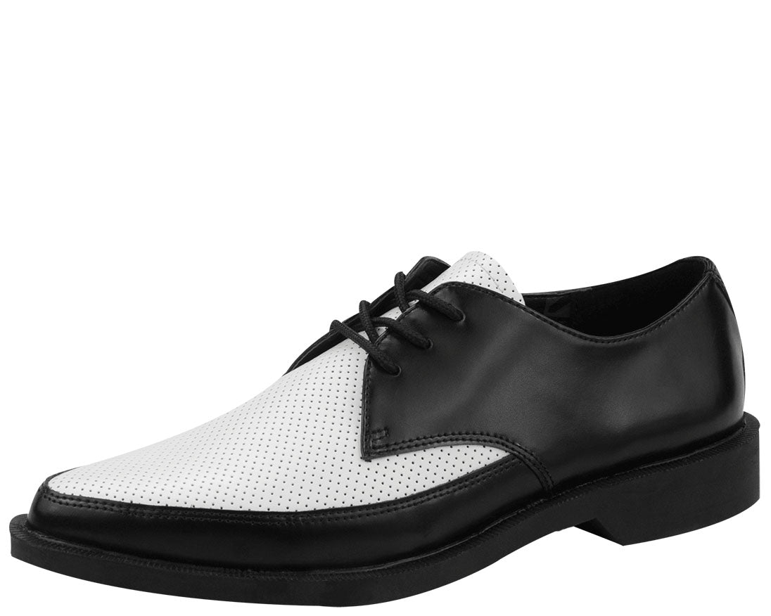 A black and white pointed toe shoe with perforated details and lace-up closure.