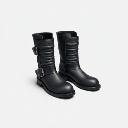 Black leather boot on a white background