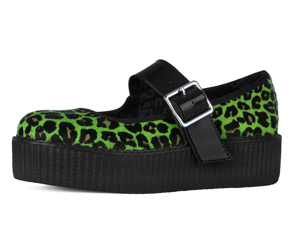 Green leopard print shoe with black platform and strap on a white background