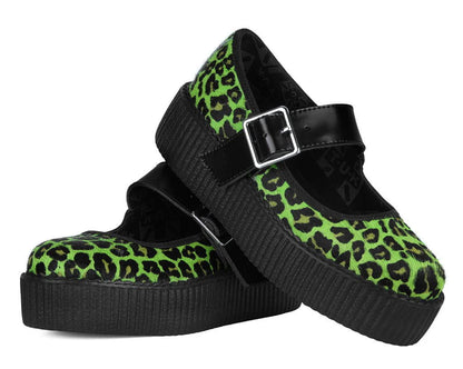 Green leopard print shoes with black buckles on a white background