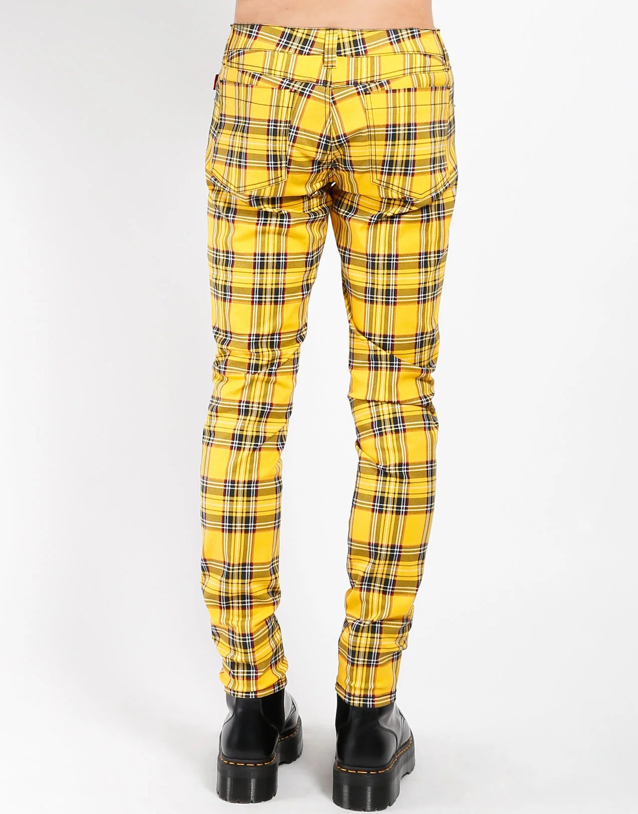 Yellow plaid pants on a white background
