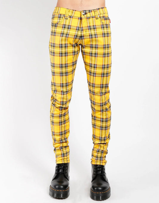 Yellow plaid pants worn by a person on a white background