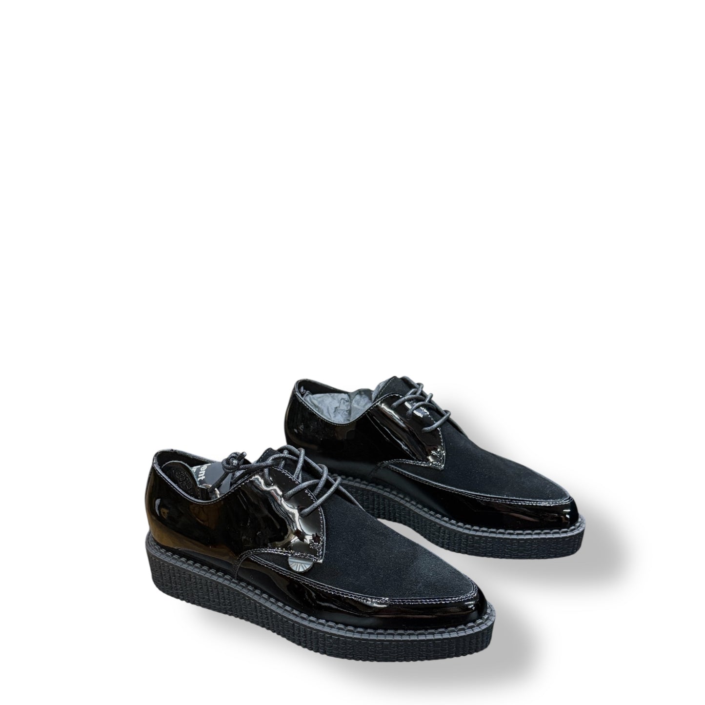 Pair of black shoes on a white background