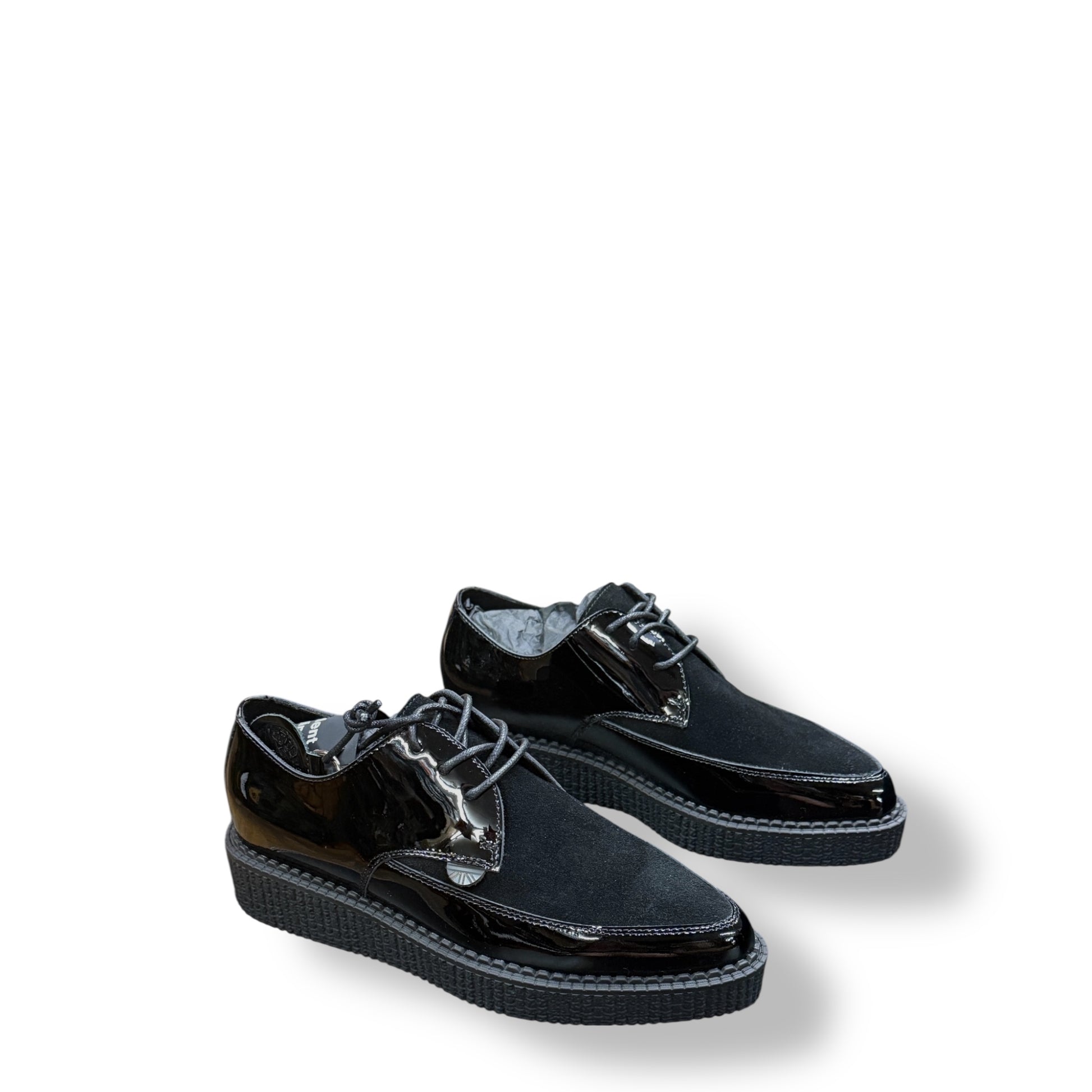 Pair of black shoes on a white background